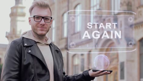 Kluger-junger-Mann-mit-Brille-zeigt-eine-konzeptionelle-Hologramm-Start-Again