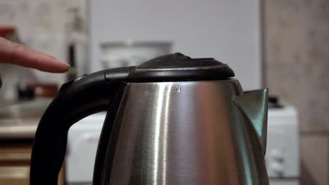 Switching-the-electric-kettle-on-and-off