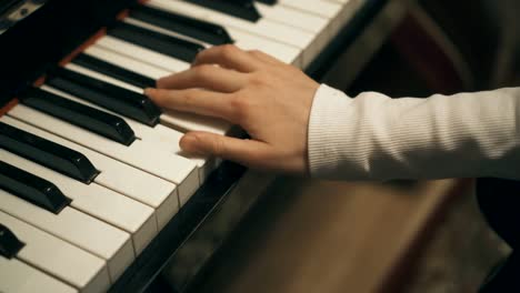 Child-learning-to-play-the-piano.