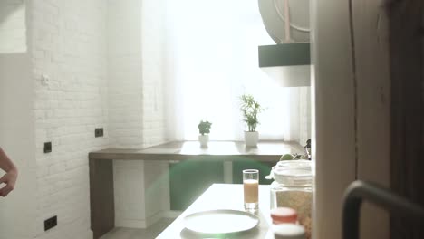 Woman-Cooking-Toast-For-Breakfast-On-Modern-Kitchen