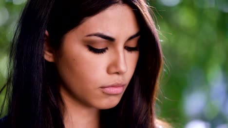 Portrait-Of-thoughtful-and-sad-pretty-Filipino-Woman-Outdoor