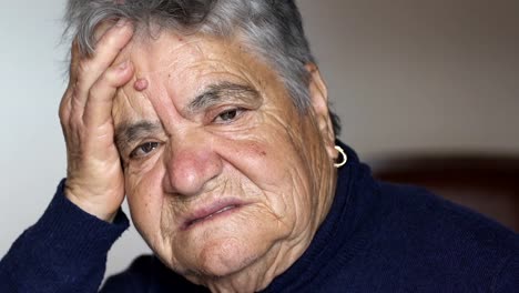 depressed-and-sad-old-woman-at-home:-lonely-old-woman-alone