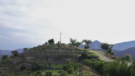 The-cross-and-statue-of-the-Virgin-Mary-at-Cemetery-in-asia