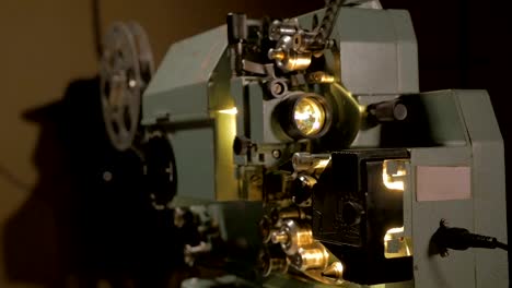 Old-mechanical-movie-projector-working