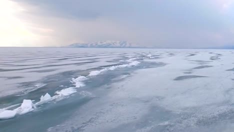 Flying-over-iced-sea-or-ocean-by-helicopter-.