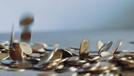 Lot-of-coins-in-the-hands-of-men.