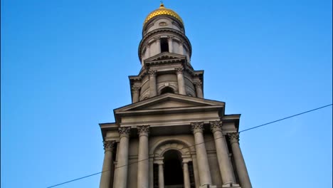 The-bell-tower-of-the-Assumption-Cathedral-Uspenskiy-Sobor-timelapse-hyperlapse-in-Kharkiv,-Ukraine