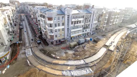 Betonarbeiten-für-den-Straßenbau-Wartung-mit-vielen-Arbeitern-und-Mixer-timelapse