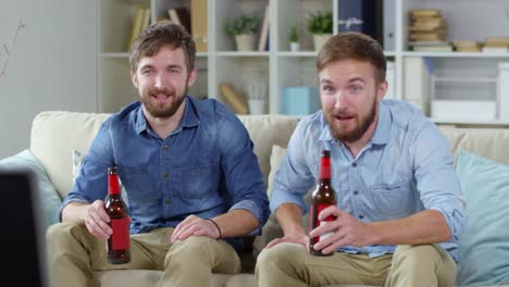 Twin-Brothers-Watching-Football-Match