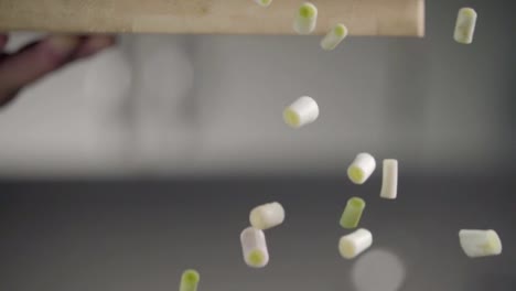 Falling-of-green-onion.-Slow-motion-240-fps