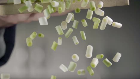 Falling-of-green-onion.-Slow-motion-240-fps