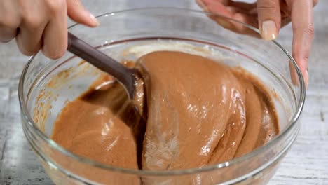 Batter-being-created-in-a-glass-mixing-bowl-in-the-kitchen.