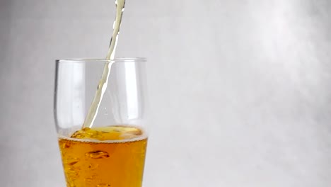 Beer-poured-into-a-glass-in-slow-motion