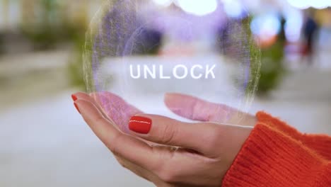 Female-hands-holding-hologram-with-text-Unlock