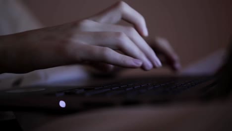 Woman-typing-on-laptop-keyboard-in-the-office.-Close-up-woman-hands-writing-on-laptop-computer-keyboard