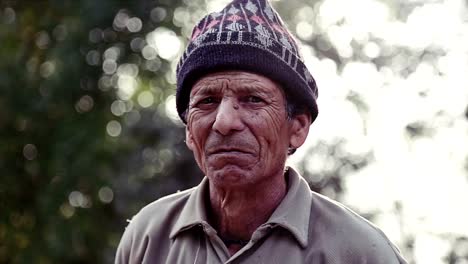 Adult-Indian-Asian-man-looking-at-camera-outdoors-portrait.