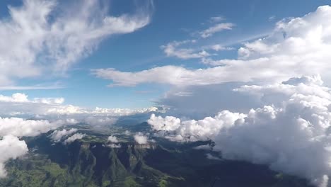 Epic-view-from-a-plane-flying-over-mountainous-region.-Aerial-Footage