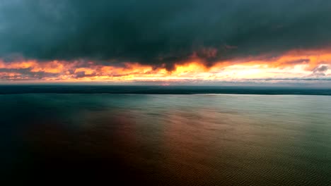 The-flight-above-the-water-on-the-beautiful-cloud-stream-background