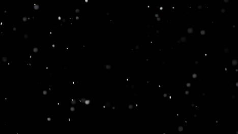 White-Snow-Falling-on-Isolated-Black-Background