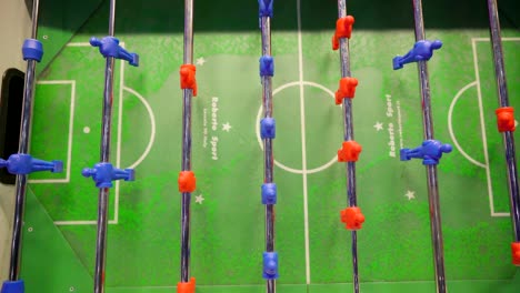 The-top-view-of-the-red-and-blue-players-on-table-soccer