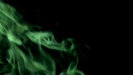 Green-Steam-Rises-from-up.-Blue-smoke-over-a-black-background.-Smoke-slowly-floating-through-space-against-black-background.-4K-UHD