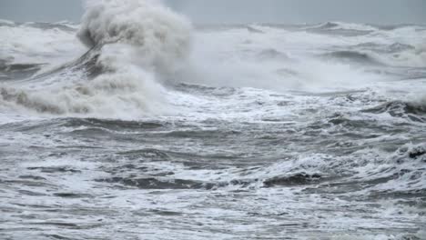 High-wave-breaking-on-the-rocks-of-the-coastline.-Extremely-Big-Wave-crushing-coast-,-Large-Ocean-Beautiful-Wave.-Super-Slow-Motion.