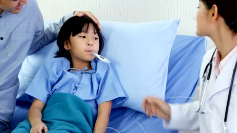 Little-girl-was-taking-care-by-doctor-at-hospital.-Doctor-visiting-to-patient-at-hospital-room.-People-with-Healthcare-and-Medical-Concept.