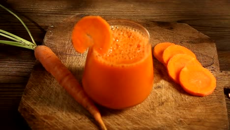 Carrot-juice-in-glass-on--table