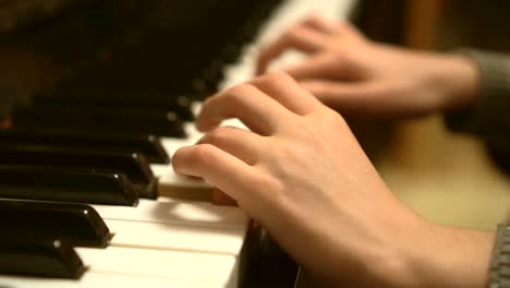 Child-learns-to-play-the-piano.