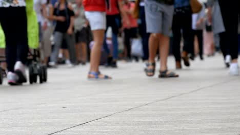 Foot-crowd-of-people-walking-on-megacity