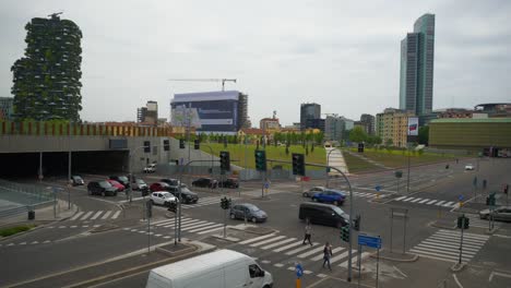 Italy-day-time-milan-modern-city-traffic-crossroad-slow-motion-panorama-4k