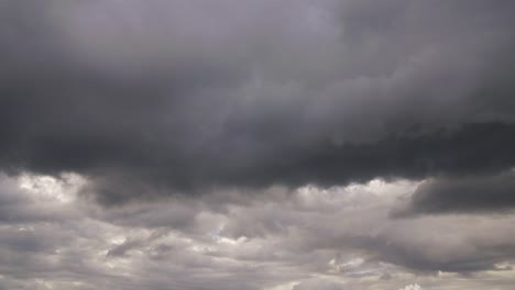 Gray-clouds-in-stormy-sky-while-overcast-weather.-Thunderstorm-sky-before-rain