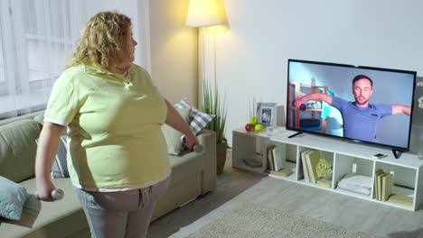 Overweight-Woman-Exercising-with-Help-of-Online-Trainer
