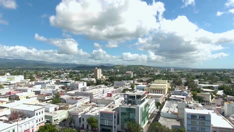 Aerial-view-of-Ponce,-PR-that-ends-with-close-up-of-a-church-in-the-town-center