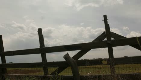 Old-rural-wooden-farm-fence---4k-time-lapse