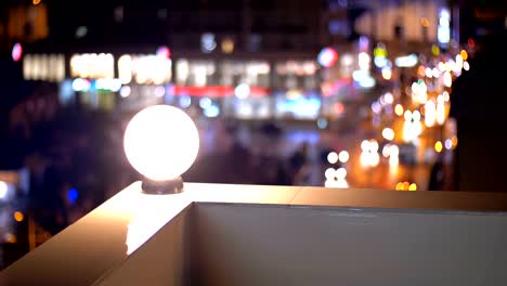 View-from-the-roof-of-the-house-at-the-blurry-lights-of-the-night-city