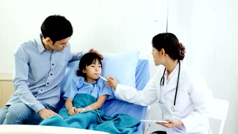 Little-girl-was-taking-care-by-doctor-at-hospital.-Doctor-visiting-to-patient-at-hospital-room.-People-with-Healthcare-and-Medical-Concept.