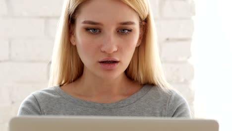 Shock,-Surprise,-Woman-Gesturing-while-Sitting-in-Office