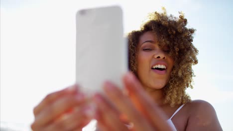 Plus-size-African-American-female-laughing-for-camera