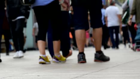 Footsteps-of-a-crowd-of-people-go-on-business-in-the-metropolis.-People-pedestrians-walk-cross-big-city