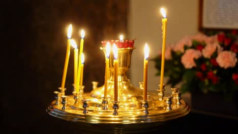 Metal-candle-light-cresset-in-church.