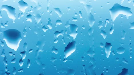 Time-lapse-rain-drops-on-a-window-glass.-Close-up-water-texture.-Loop-movie