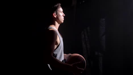 Basketball-player-waiting-in-dark-room-and-going-to-play-game-or-championnat