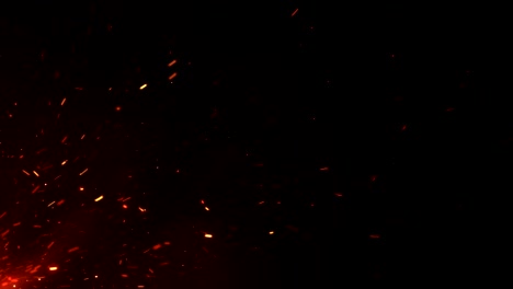 Beautiful-Burning-Hot-Sparks-Rising-from-Large-Fire-in-Night-Sky.-Abstract-Isolated-Fire-Glowing-Particles-on-Black-Background-Flying-Up.-Looped-3d-Animation.