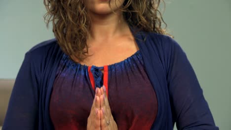 Meditating-woman-with-opening-lotus-mudra,-special-hands-position-for-meditation