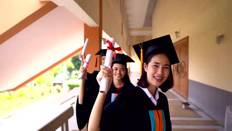 Black-graduates-wear-black-suits-on-graduation-day-at-university.