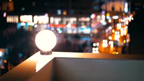 View-from-the-roof-of-the-house-at-the-blurry-lights-of-the-night-city