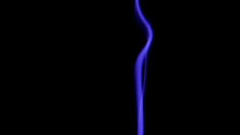 Blue-Steam-Rises-from-up.-Blue-smoke-over-a-black-background.-Smoke-slowly-floating-through-space-against-black-background.-Slow-Motion.