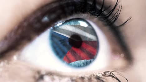 woman-blue-eye-in-close-up-with-the-flag-of-Czech-Republic-in-iris-with-wind-motion.-video-concept