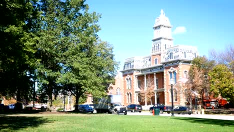 Daytime-establishing-shot-of-a-Victorian-building-in-small-american-town